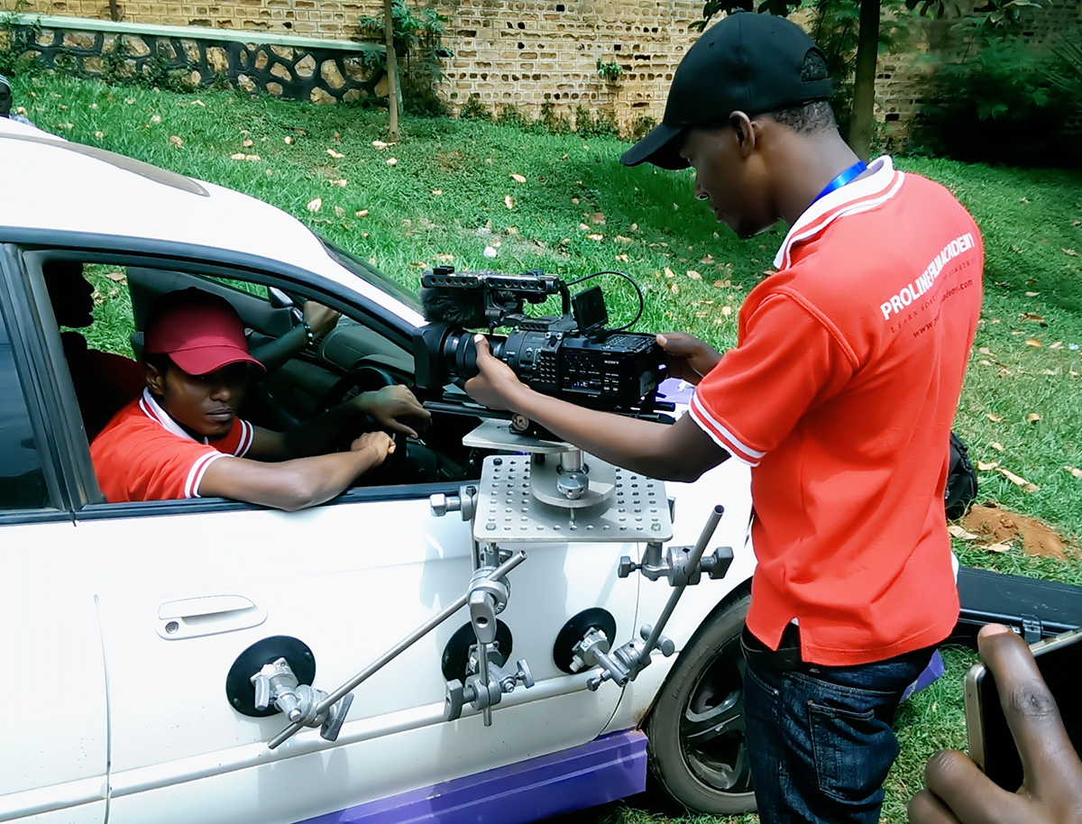 students in the acting for film class learning how to use camera rigs during a short film to be presented in the uganda film festivals during their monthly onlocation practicals at Proline Film Academy